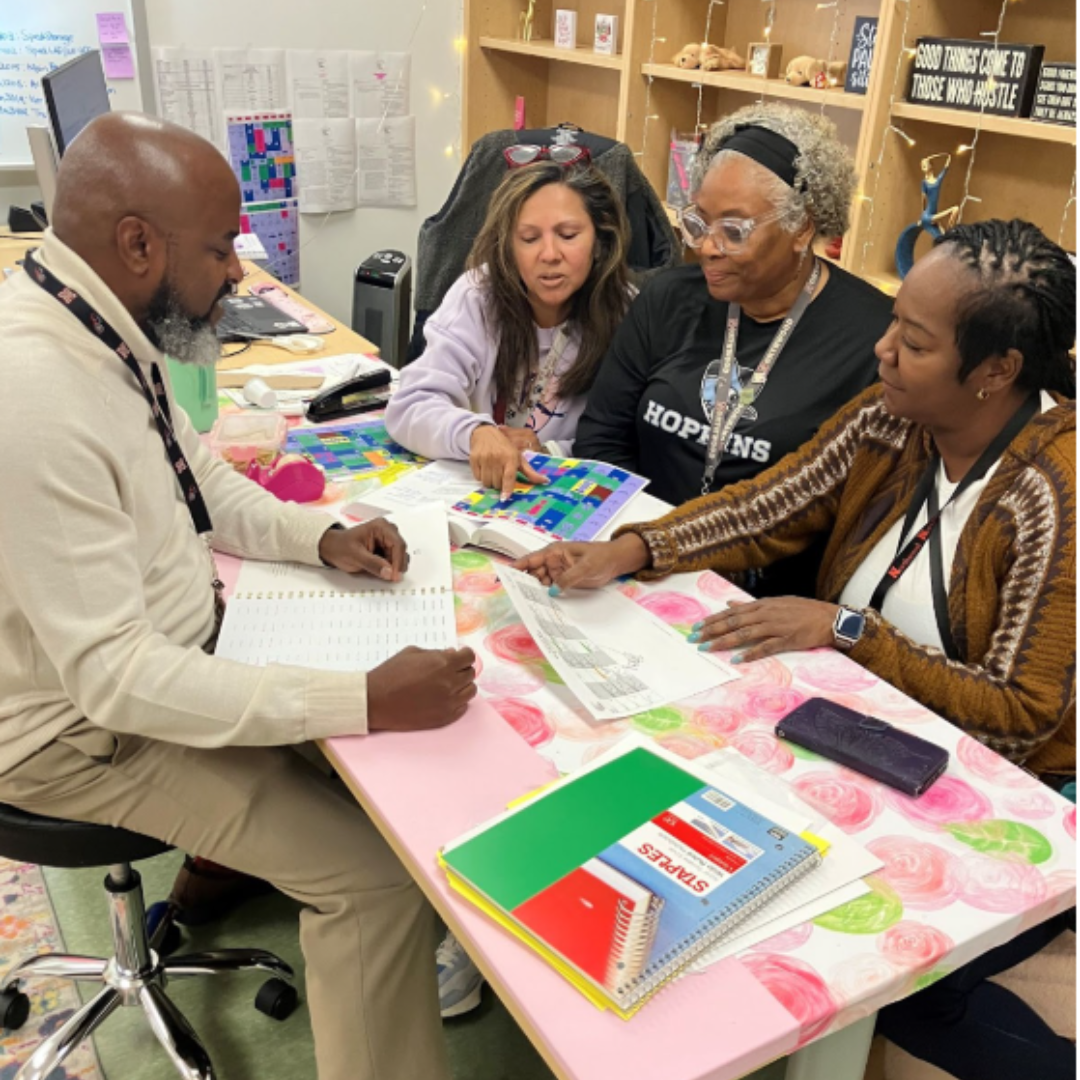 Trellis Jones and staff.png