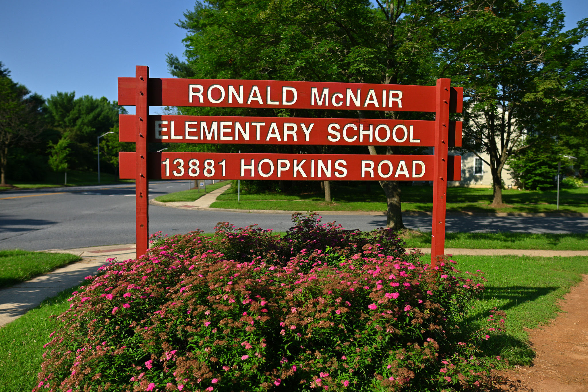 Sign with school name and address